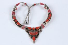 A TIBETAN CORAL NECKLACE.