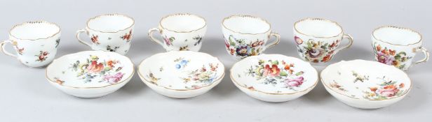 SIX MEISSEN DEMI-TASSE PORCELAIN CUPS, painted with floral sprays, together with four matching