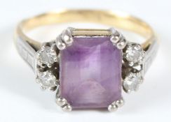 AN 18CT YELLOW GOLD, DIAMOND AND AMETHYST RING.