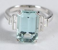 AN 18CT WHITE GOLD, DIAMOND AND AQUAMARINE RING, approx. 6ct.