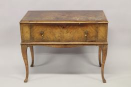 A FIGURED WALNUT SINGLE DRAWER SIDE TABLE, 20TH CENTURY, on cabriole legs. 100cms long x 48cms