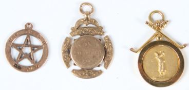 A GROUP OF THREE 9CT GOLD MEDALS.