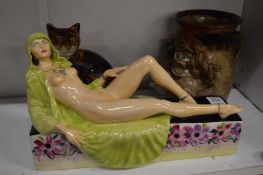 Porcelain figure of a reclining female nude by Victoria Bourne for Peggy Davies together with two