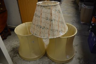 Three lamp shades.