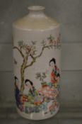 A Chinese cylindrical bottle painted with figures in a landscape under a tree.