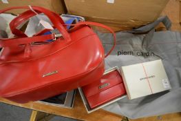 A Pierre Cardin red leather handbag and other items.
