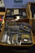A quantity of boxed military models of vehicles.