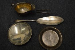 Silver items to include a sauce boat and fish slice.