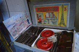 A group of construction kits by Primus and Kliptiko, boxed together with a card game.