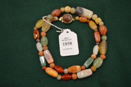 A specimen hard stone bead necklace.