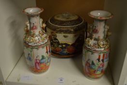 A pair of early 20th century Chinese famille rose vases, rim chips together with a modern Satsuma
