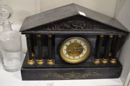 A slate mantel clock.