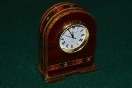 A Mappin & Webb bedside clock.