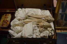 A case containing wedding dress and shoes.