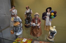 A group of six Royal Doulton figures, Embroidering HN2855, Farmer HN3195, The Blacksmith HN2782,