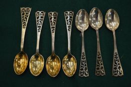 A set of seven silver coffee spoons.