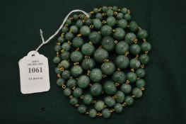 A jade bead necklace.