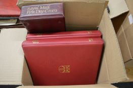 GB stamps, presented in two red SG Great Britain monogram albums, first album is 128 stamps QV to