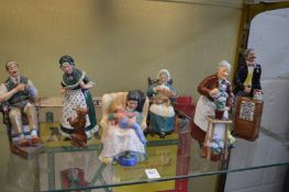 A group of six Royal Doulton figures, The Bachelor HN2319, Old Mother Hubbard HN2314, Sweet Dreams