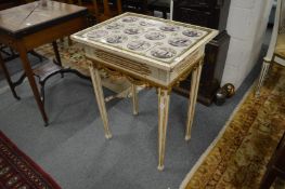 A painted occasional table, the top inset with twelve delft tiles (faults).