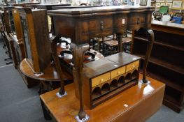 Georgian style walnut fold-over card table with a single frieze drawer on cabriole legs.