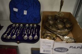 A cased set of twelve silver plated apostle coffee spoons with sugar nips together with a small