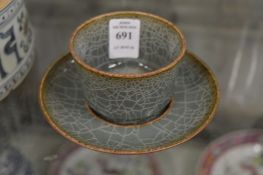 A Chinese crackle glazed bowl and stand.