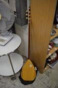 A Turkish lute with bag.