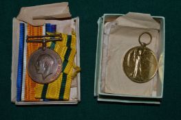 A Territorial war medal presented to 763 gunner P Muckett RA together with a WWI medal presented