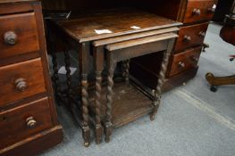 An oak nest of tables.