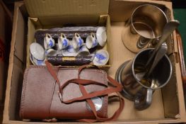 Miniature porcelain cups and saucers, a camera, pewter tankards etc.