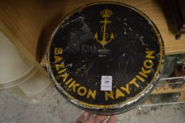 A Greek navy black japanned circular tin.