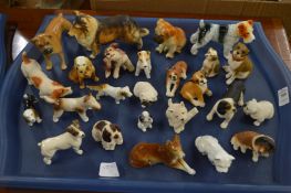A collection of porcelain models of dogs.