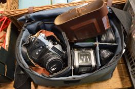Camera bag containing a Zenith Zenit-E camera, other cameras and accessories.