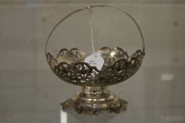 A white mounted pedestal bowl with strap work handle and Niello decoration.