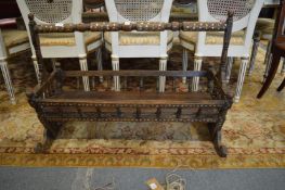 An Islamic mother of pearl inlaid hardwood cradle.