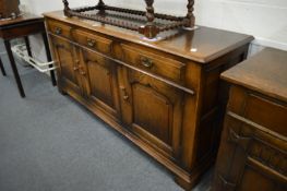 A good reproduction oak sideboard.