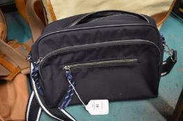 A mint velvet shoulder bag.