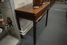 Mahogany fold-over tea table.