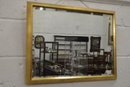 Gilt framed rectangular mirror.
