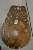 A large Chinese carved hard stone Bi disc.