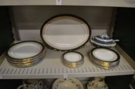 A quantity of Royal Worcester Regency plates and a blue and white tureen.