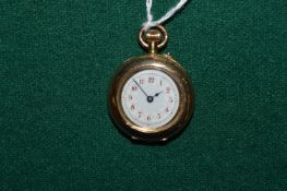 A ladies gold and enamel decorated fob watch (enamel af).