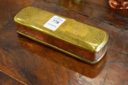 A Dutch brass and copper tobacco box.