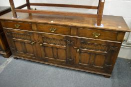 A good reproduction oak sideboard.