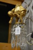 Decorative, gilded and cut glass cherub wall mounted lantern.