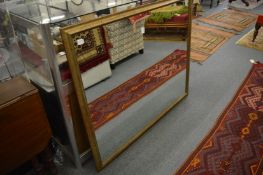 Gilt framed rectangular wall mirror.