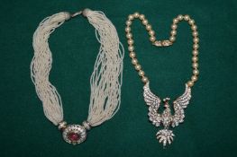 Two decorative necklaces.