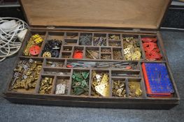 A large box of Meccano parts.