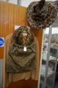 A ladies faux fur trimmed jacket, size 12 together with a handbag and hat to match.